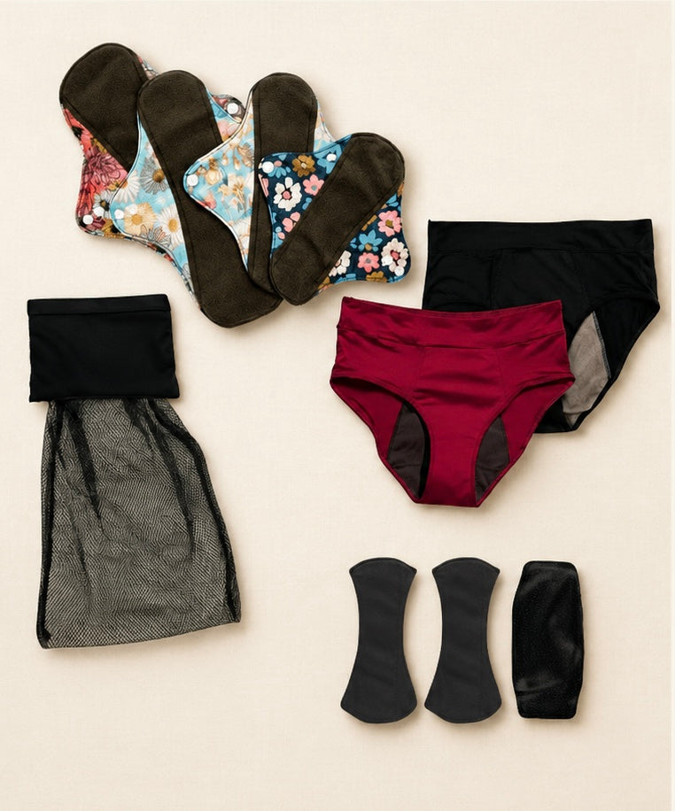 Flat lay of the Mighty Eve Period Starter Pack contents — pants, pads and washbag