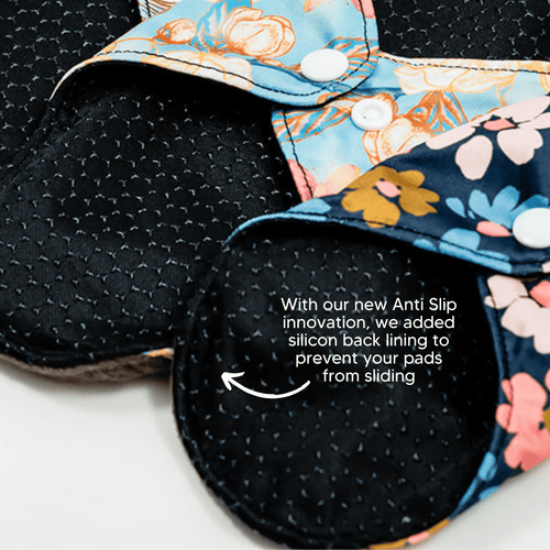 Mighty Heavy Night Popper Pad - MightyEve Floral - patterned period pads with anti - slip silicon back lining on a white background
