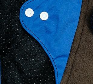 Mighty Light Popper Pad - MightyEve Close - up of mighty eve popper pads front and back - blue and black bamboo fabric with white buttons