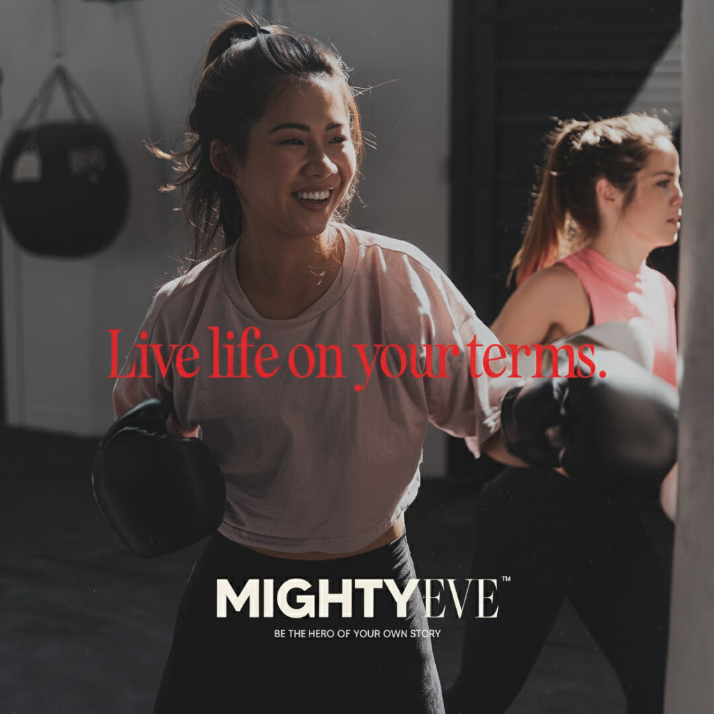 Two women in a boxing gym with text 'Live life on your terms' and 'MightyEve' branding.